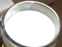my mug full of foamy, almost white aloe vera-and-orange juice